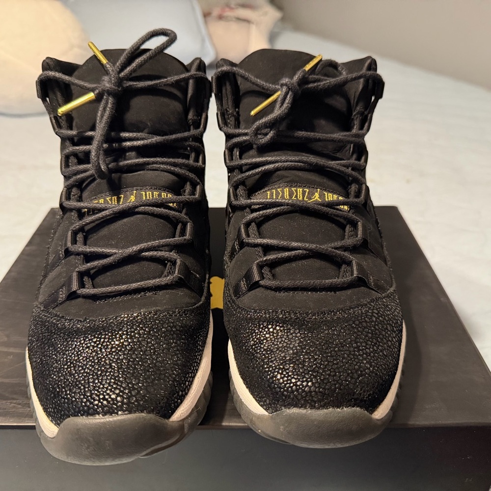 Jordan Retro Black and Metallic Gold Sneakers